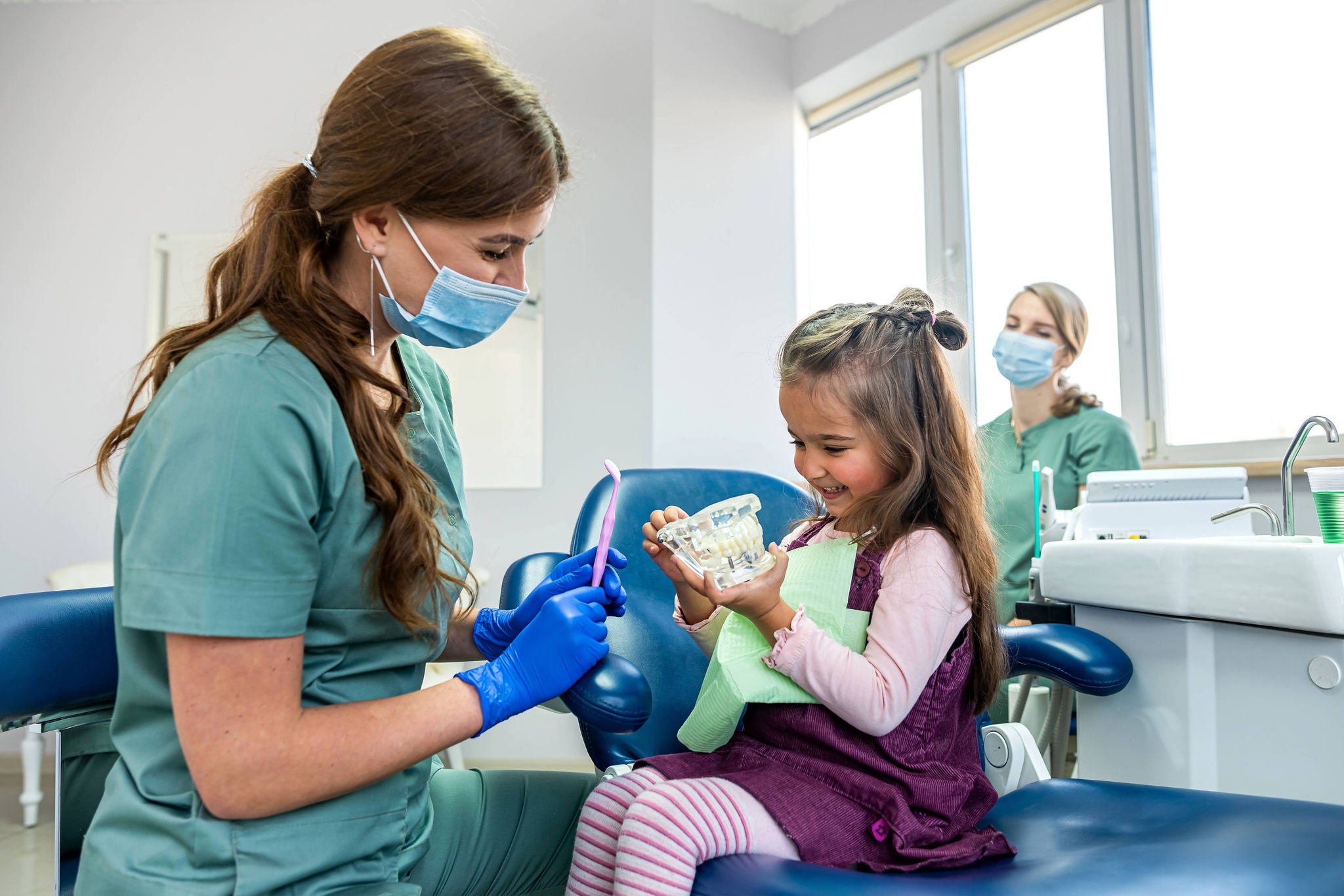 Healthcare worker using NUGEN® HLD-CD disinfectant in medical environment